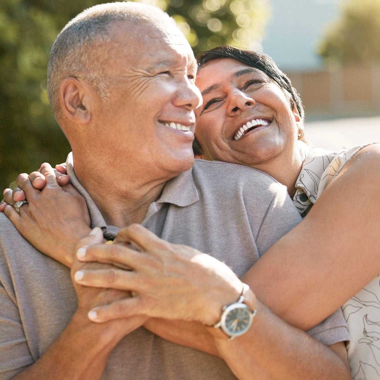 loving elderly couple embracing